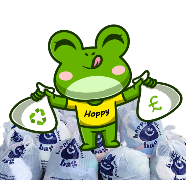 Hoppy holding a bag of donated clothes